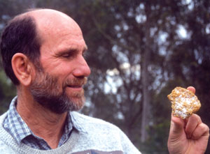 Jack Lange holding gold-bearing quartz.