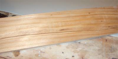 Wood planing with a rotating cutting head