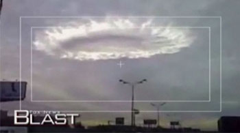 Like a scene from a sci-fi movie, Fox News reported on this glowing halo in the skies over Moscow Russia in October, 2009. It was a weather anomaly caused by several weather fronts passing through Moscow as the sun shined from the west.